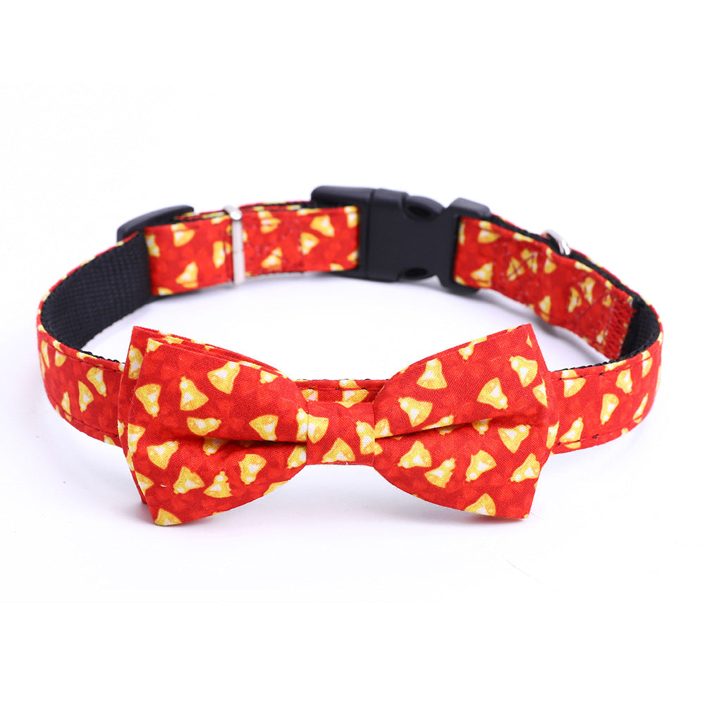 A Large Dog Bow On A Christmas Pet Collar